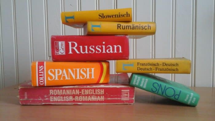 Overcome Language Barriers by having a phrasebook or dictionary