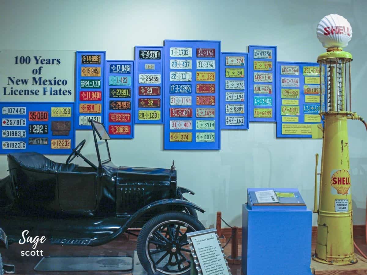 A display showing New Mexico license plates over the years