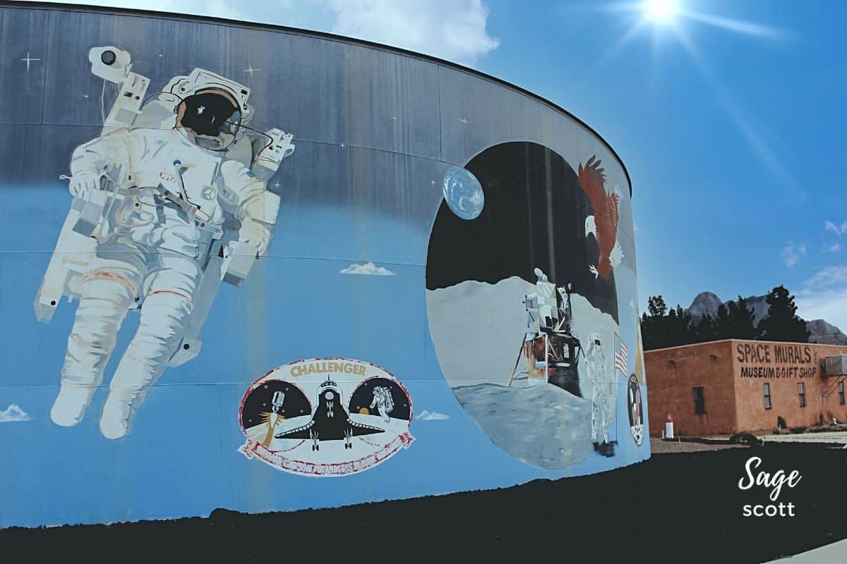 Scenes from space painted on a water tank near Las Cruces NM