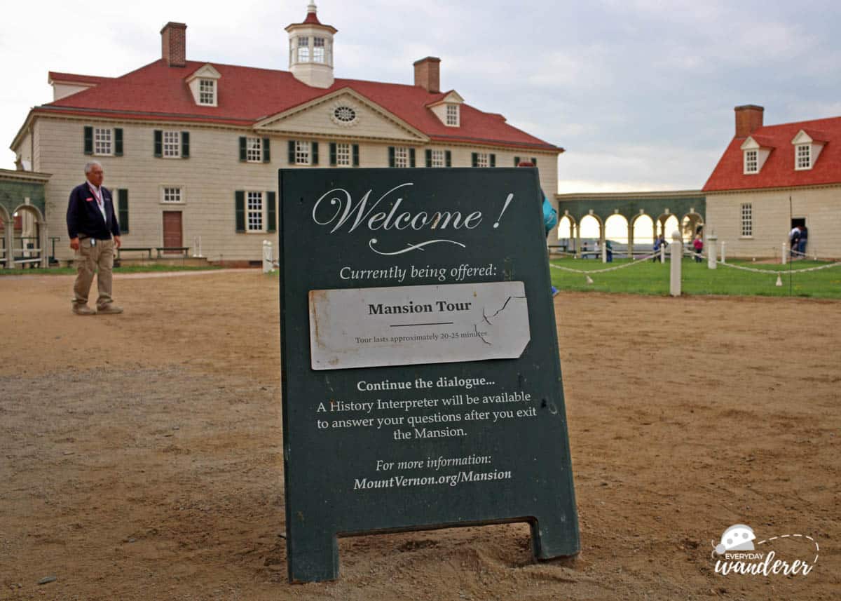 A sign indicating where visitors should line up for a mansion tour at George Washington's Mount Vernon.