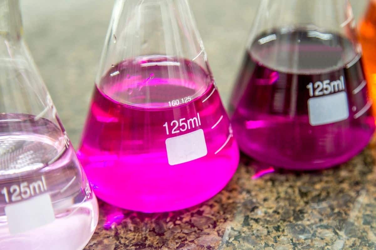 Beakers of colored liquid