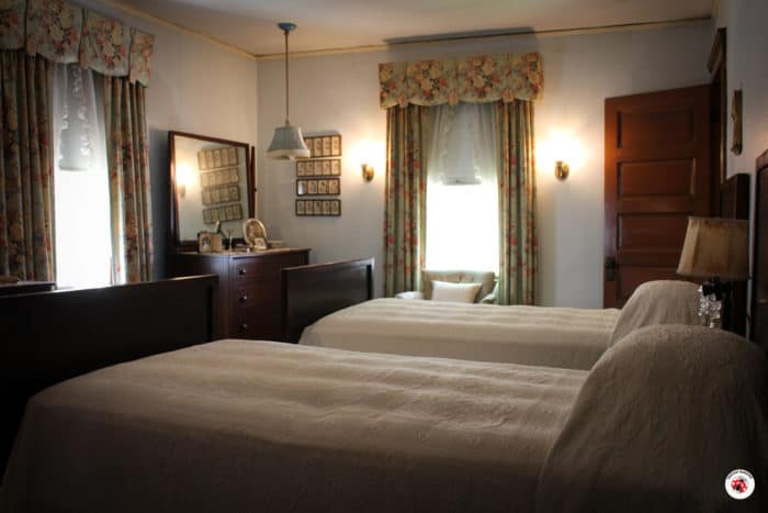 Two beds side-by-side in the master bedroom of the JFK birthplace.