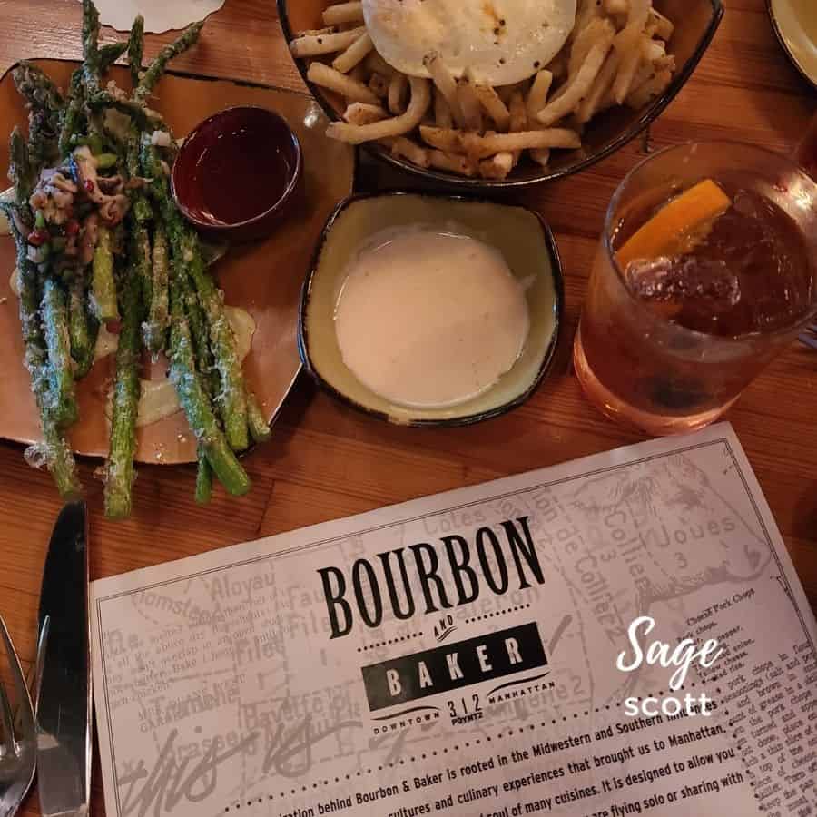 A menu and dishes on the table at Bourbon & Baker