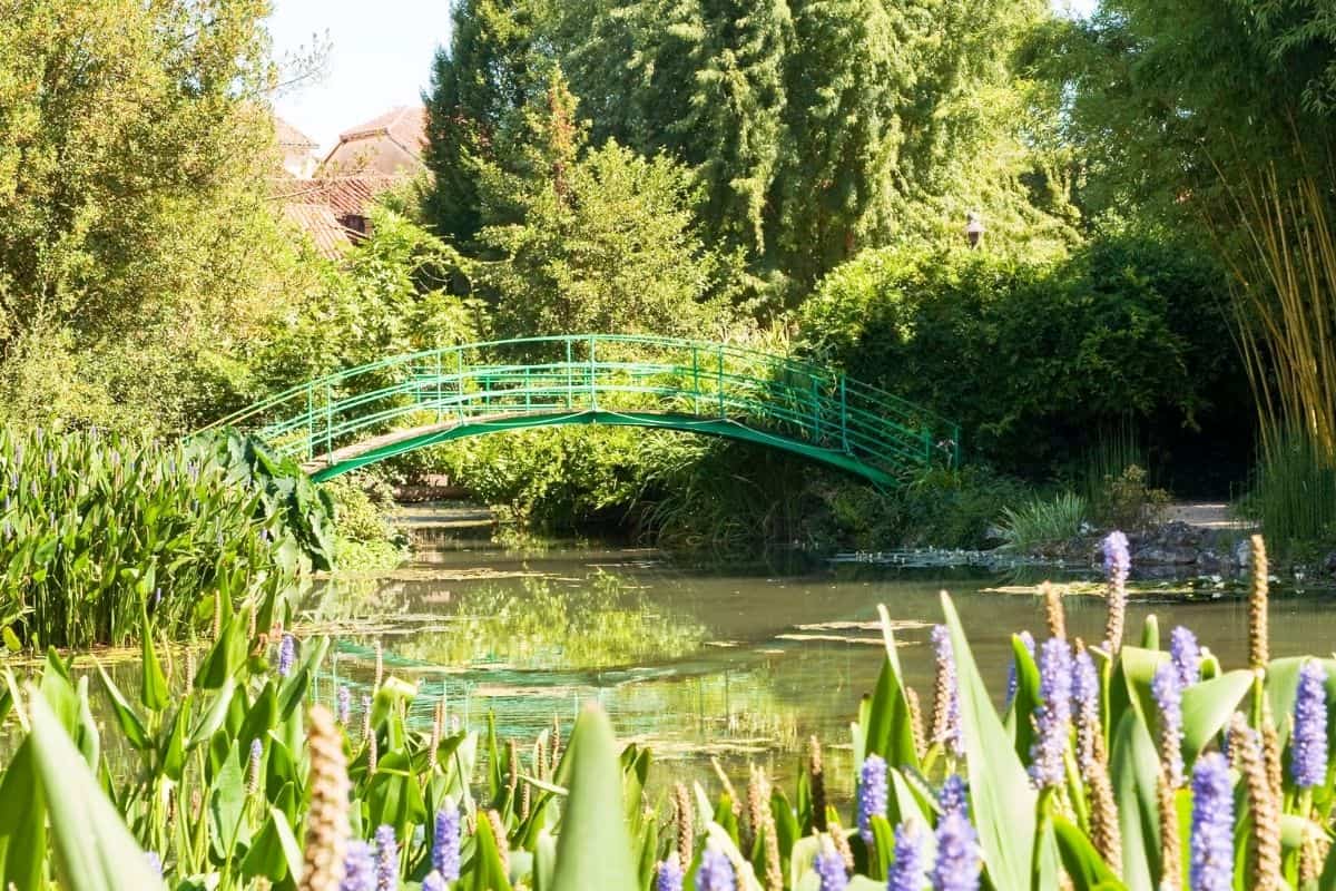 Green Japanese footbridge in Monet's Garden in Giverny