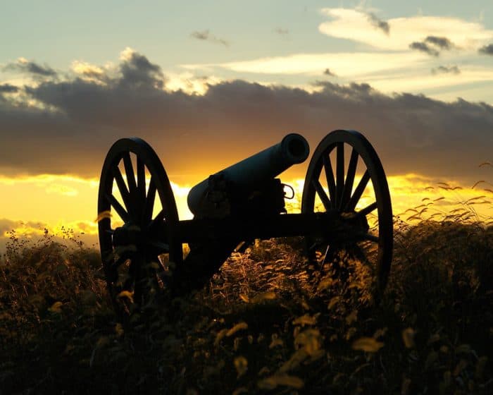 Civil War era cannon at sunset