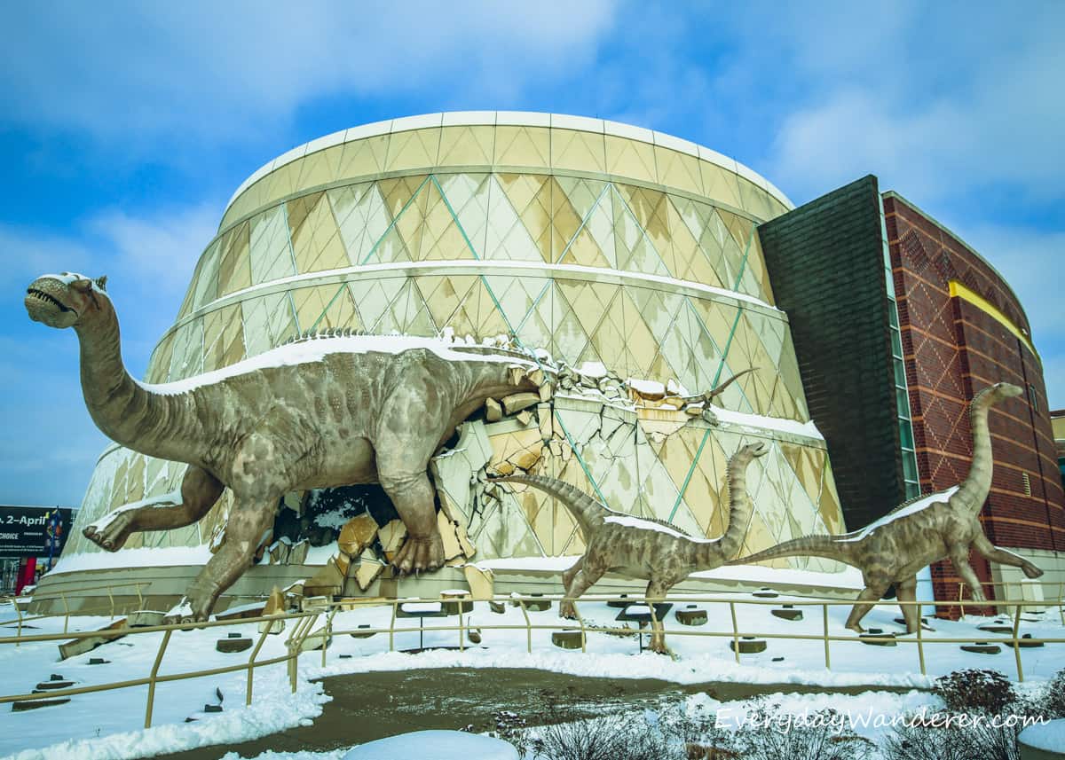 Dinosaurs are a big part of the exterior of The Children's Museum of Indianapolis