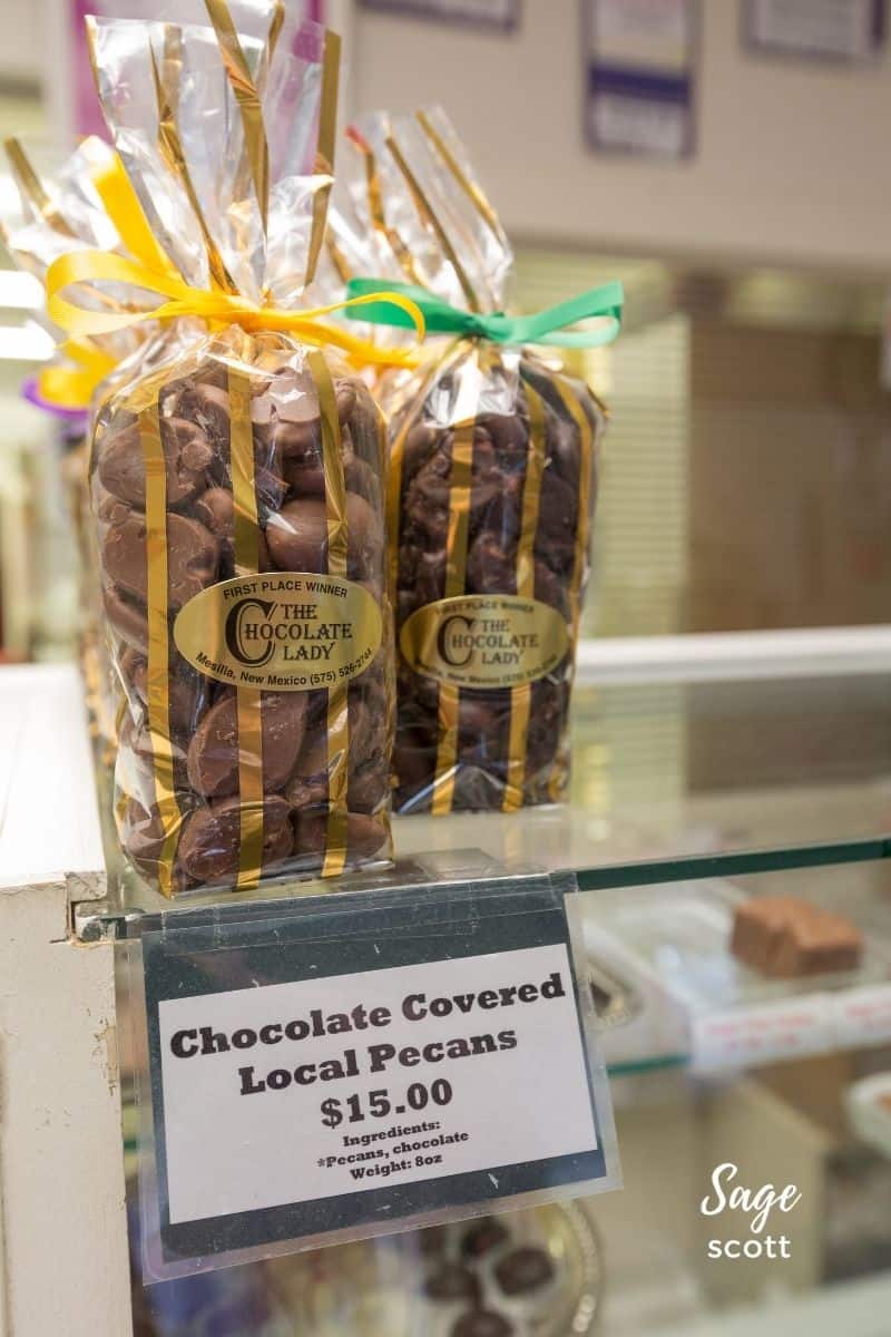 Ribbon-wrapped bags of chocolate covered pecans at The Chocolate Lady