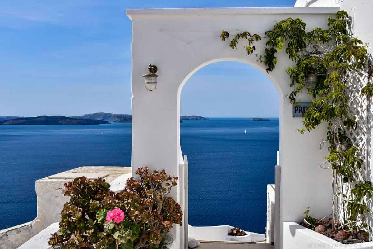 An arched door to the sea in Santorini, Greece.