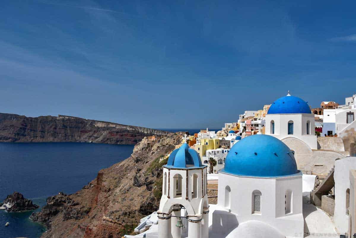 Santorini is known for its blue topped white buildings