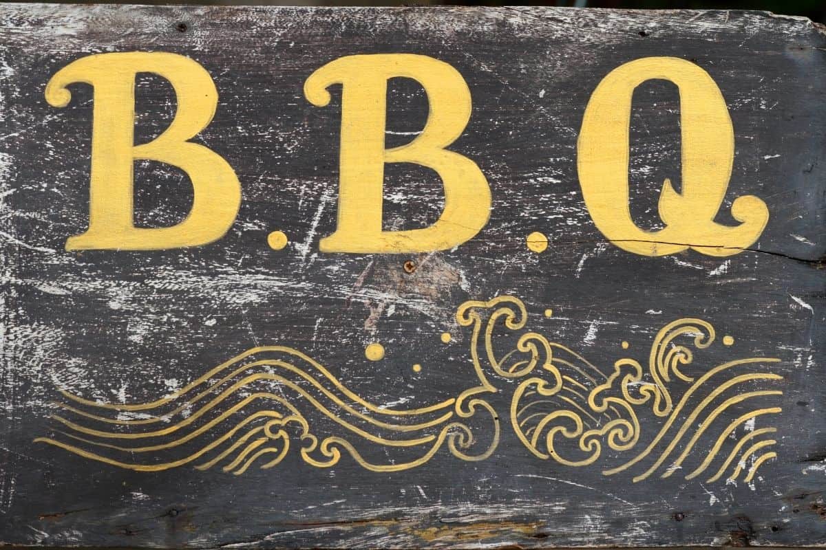 Chalkboard sign with the word "BBQ"