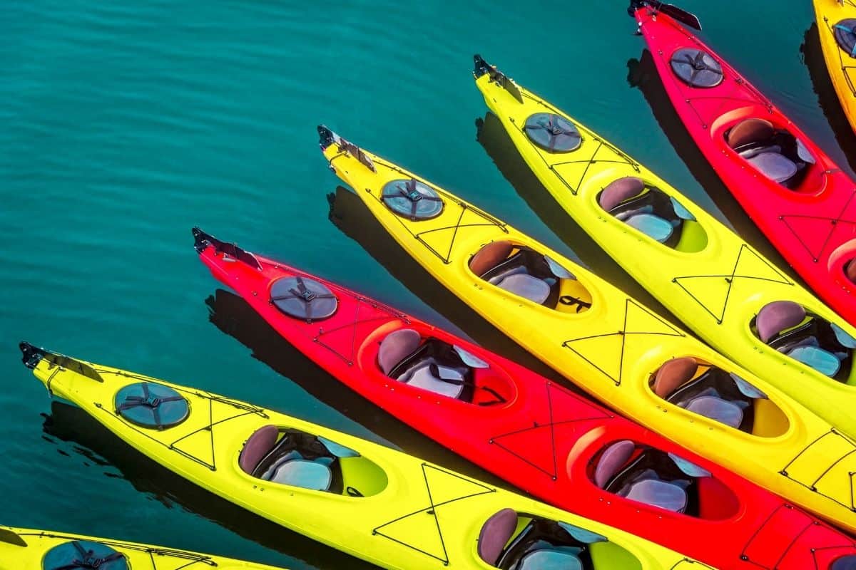 Red and yellow kayaks in the water