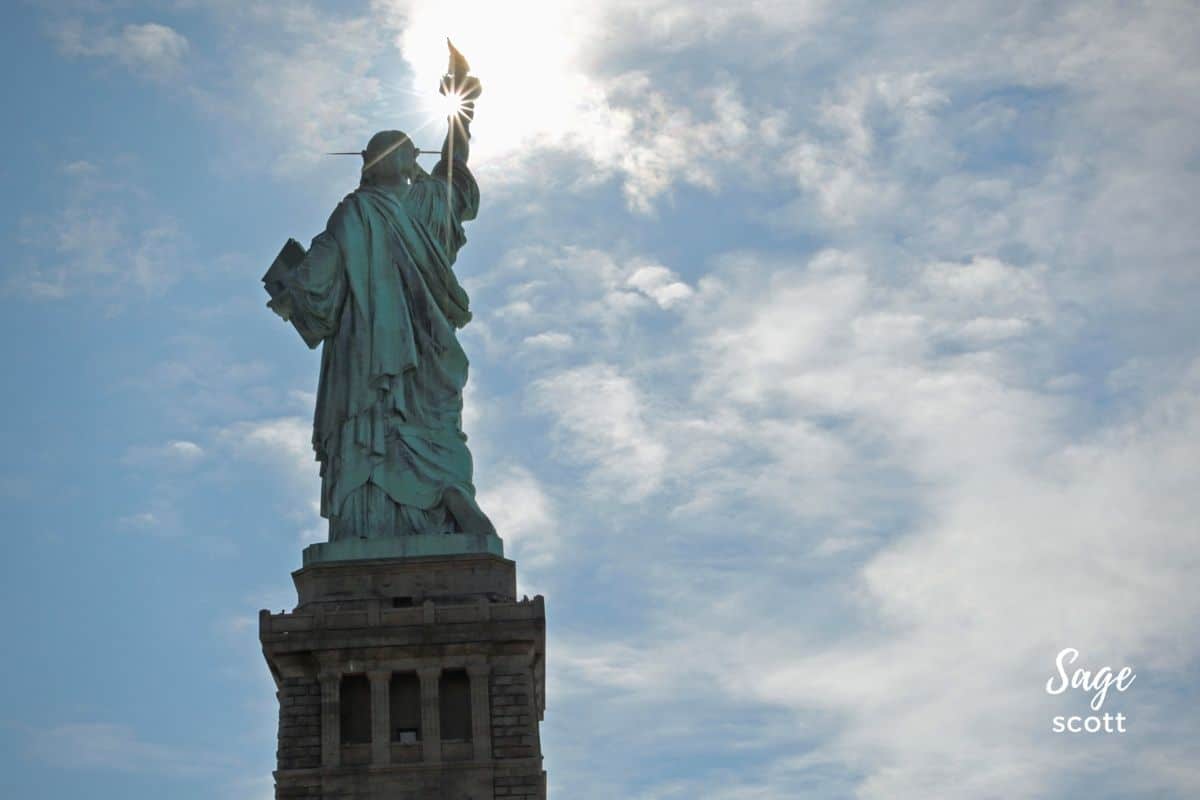 Statue of Liberty with light reflecting in torch