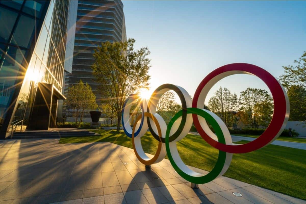Olympic rings with sun flare in Tokyo