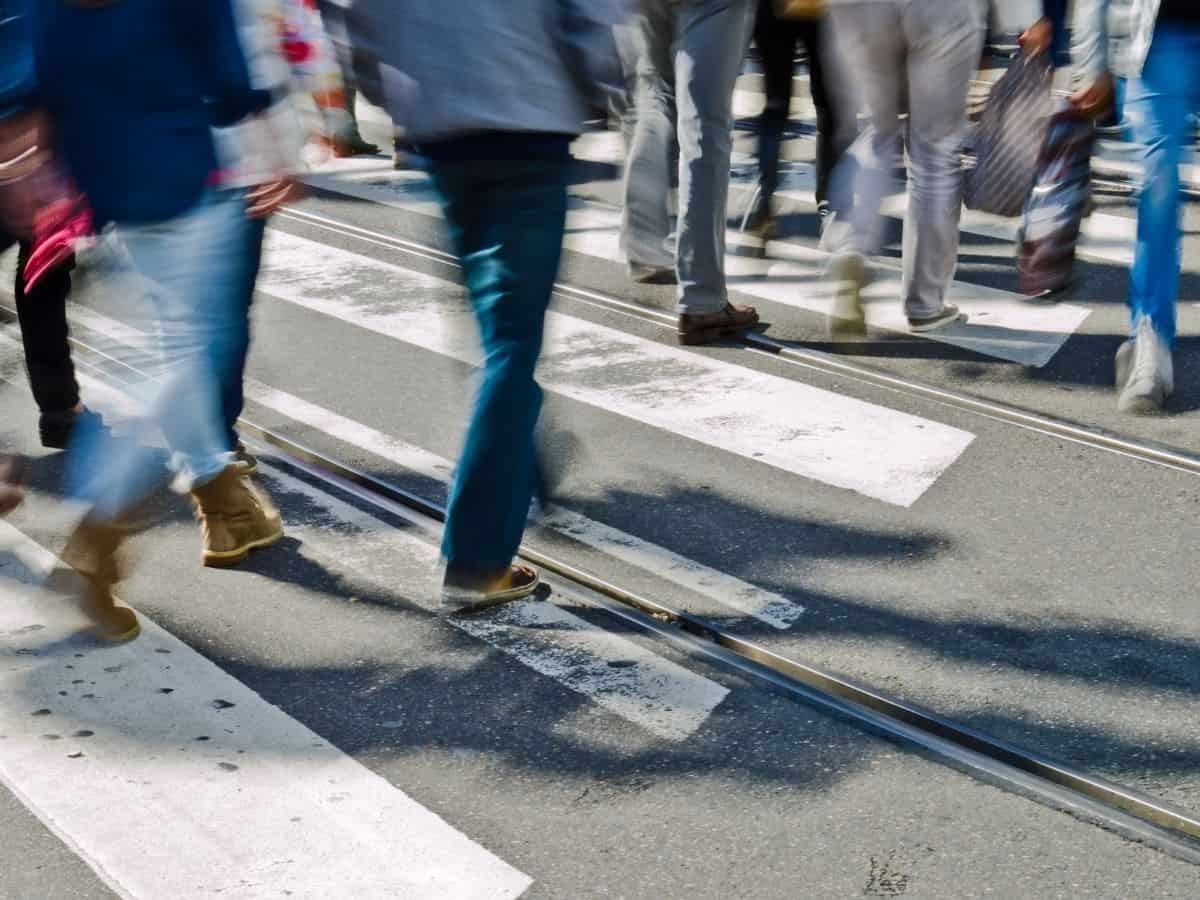A group of pedestrians crossing the street