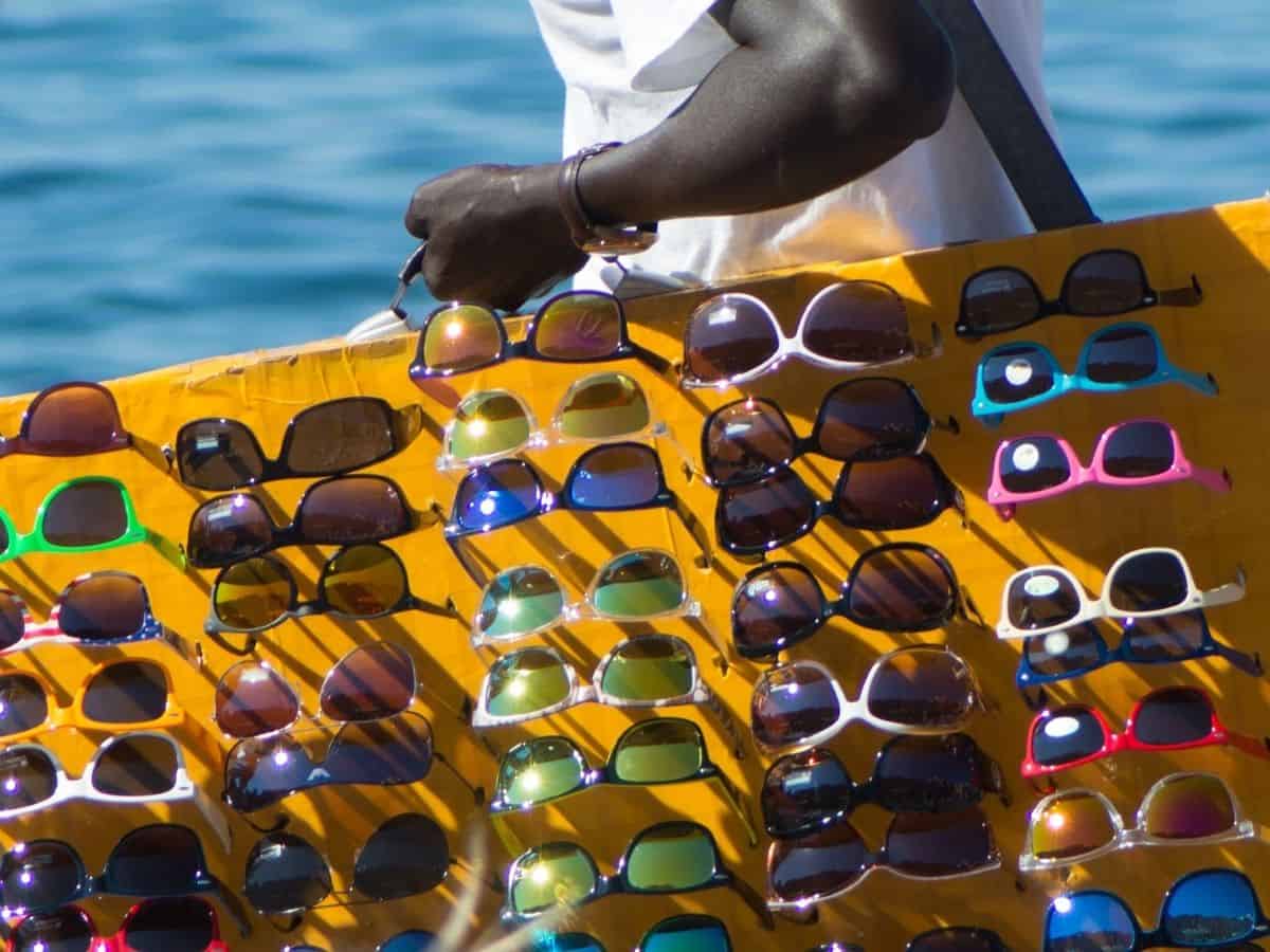 A man selling sunglasses