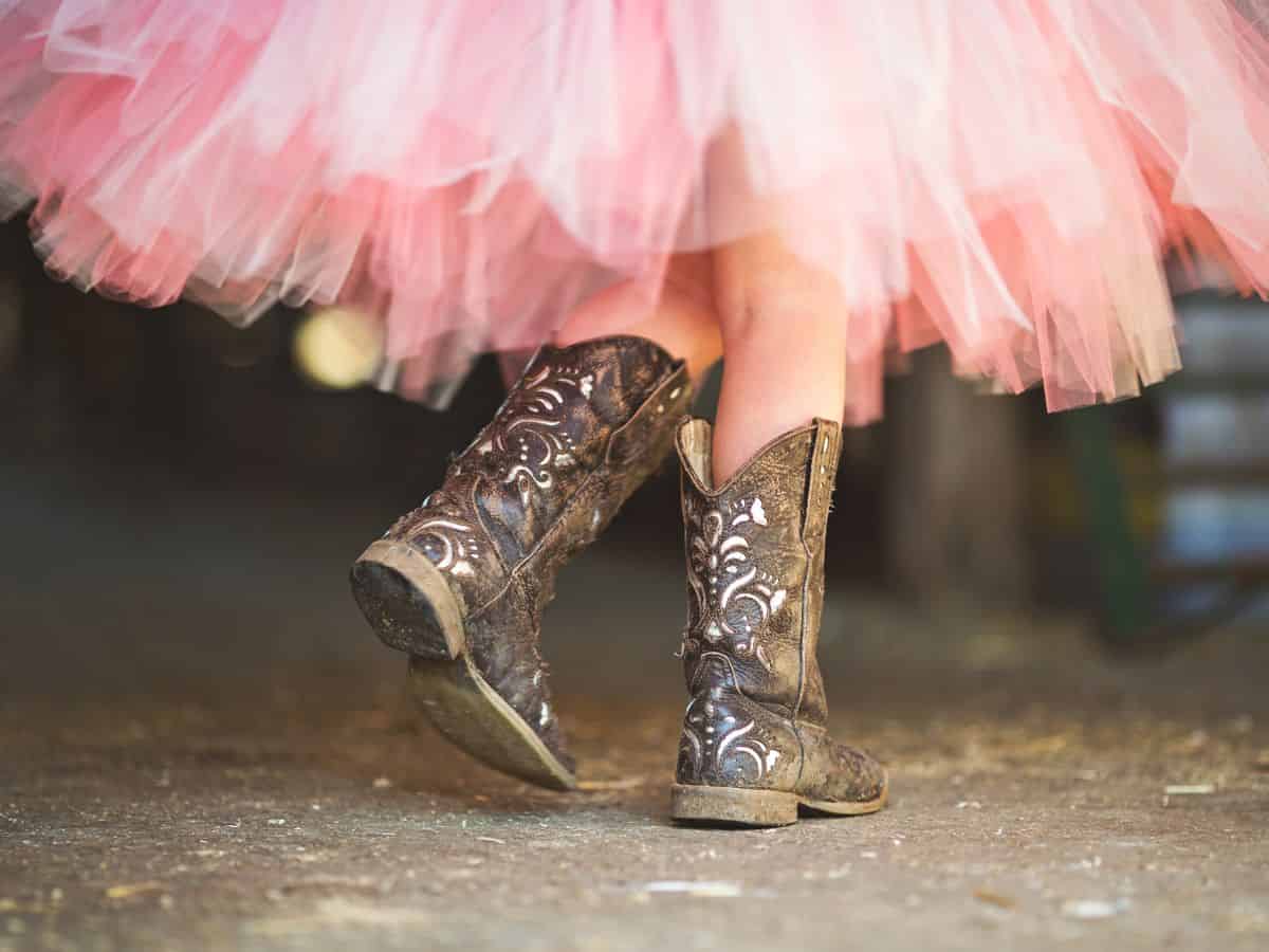 Girl Wearing Cowboy Boots with a Pink Tutu