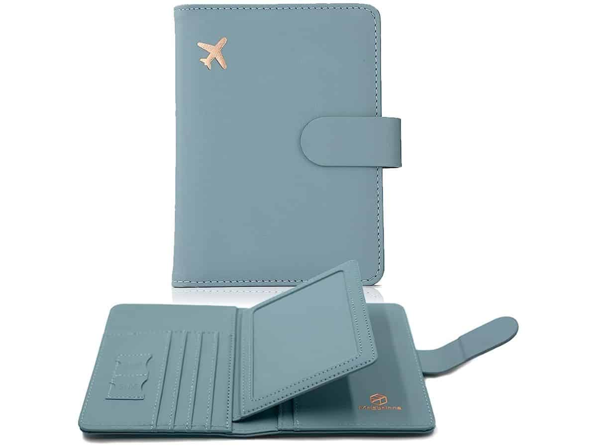 A bluish-grey passport holder