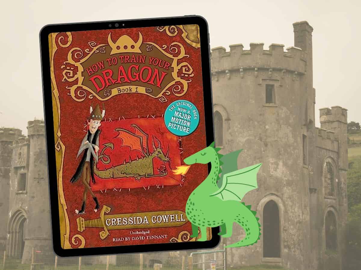 A dragon on it next to a castle on the cover of an audiobook.