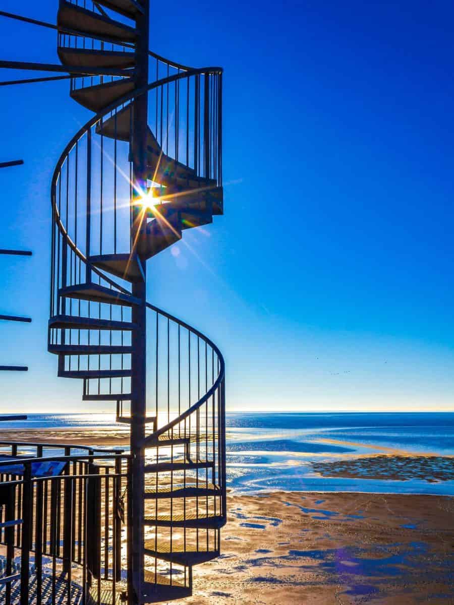 A spiral staircase of a lighthouse by the Wadden Sea in Germany.
