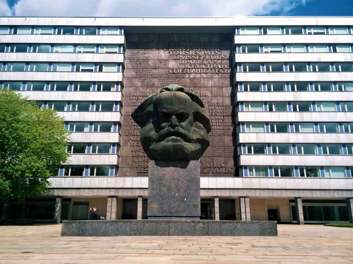A statue of Karl Marx in front of a building in Chemnitz, Germany.
