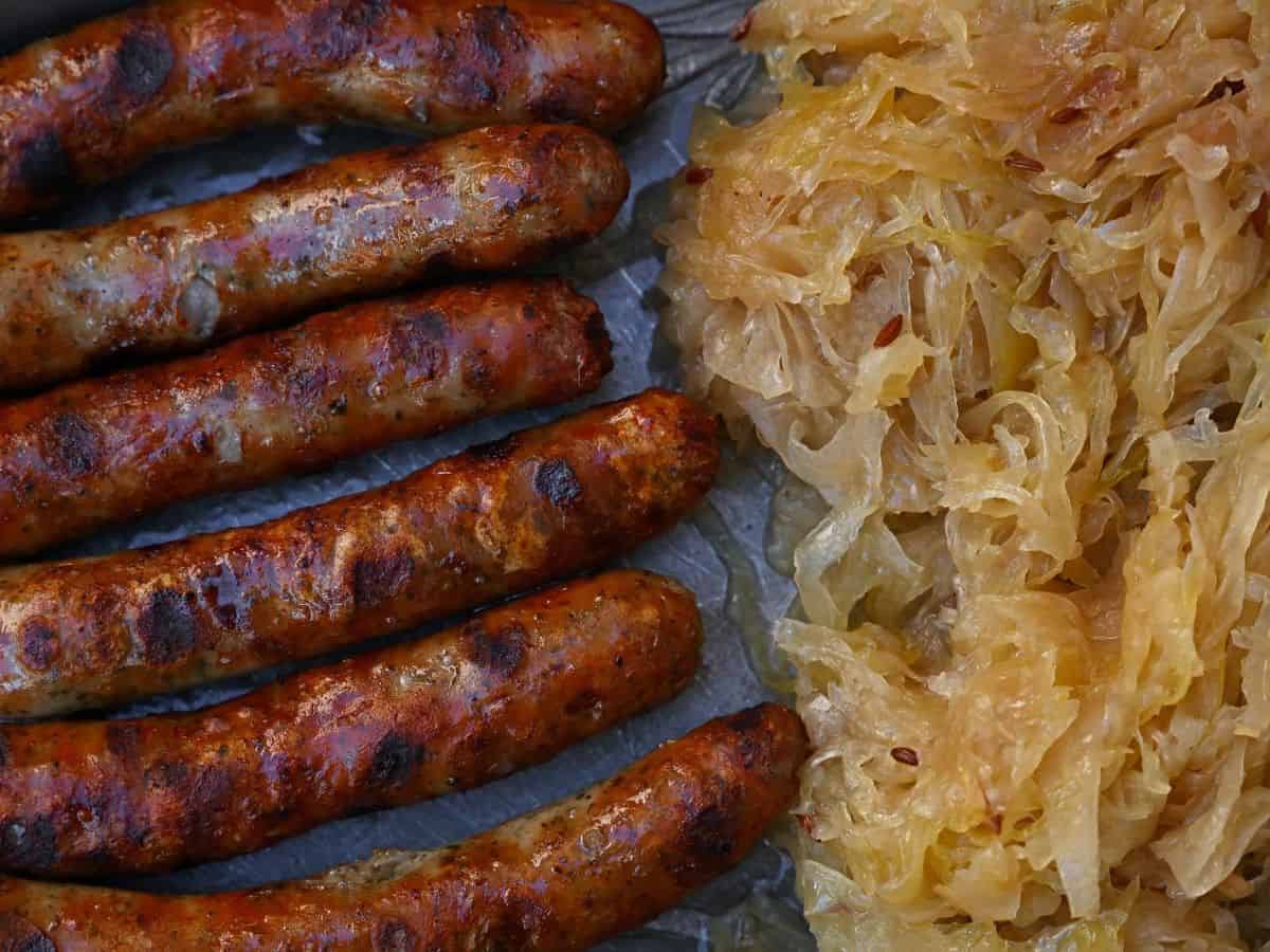 A classic German dish featuring sausages and sauerkraut.