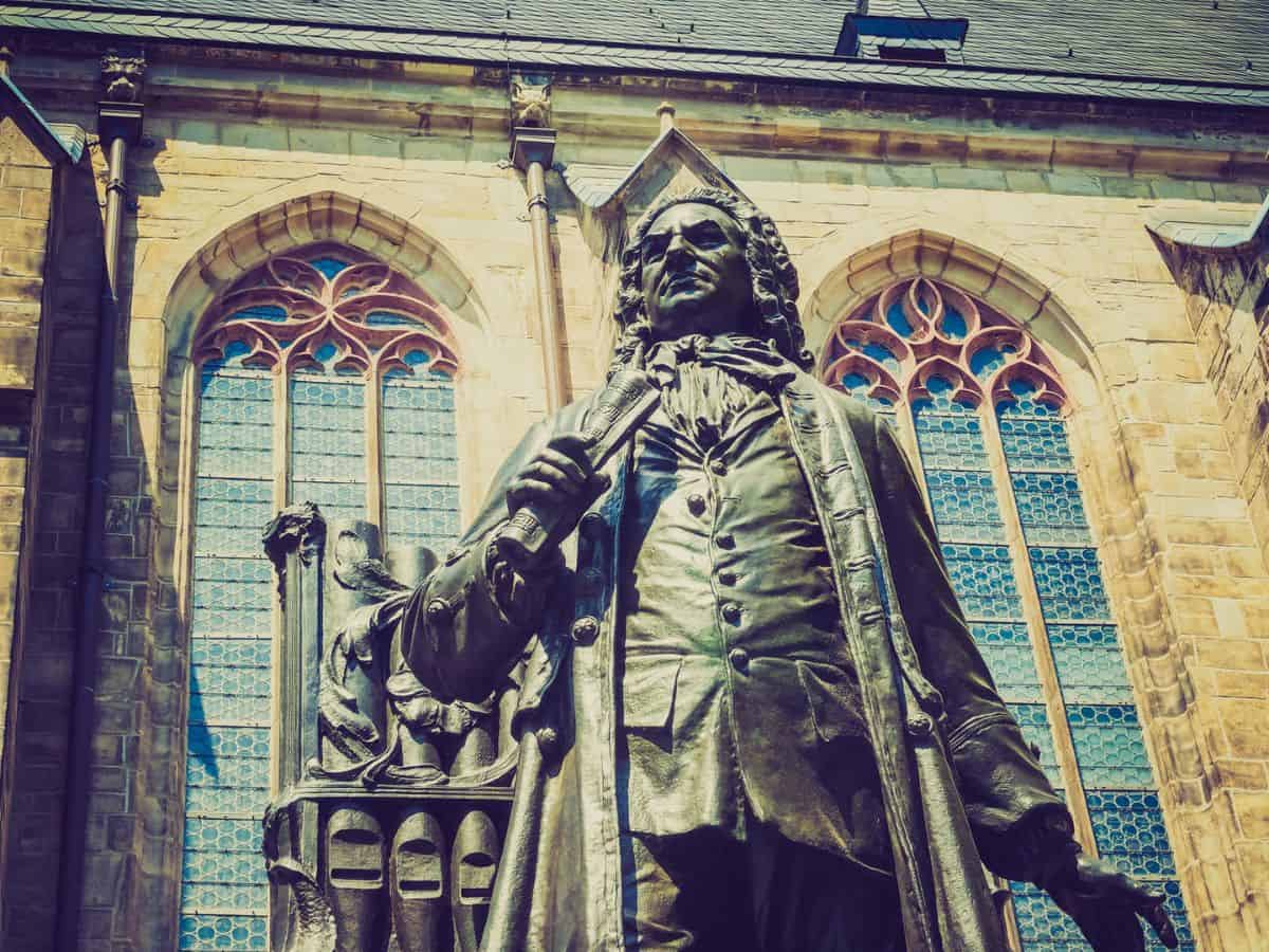 A statue of Johann Sebastian Bach in front of a church in Leipzig, Germany.