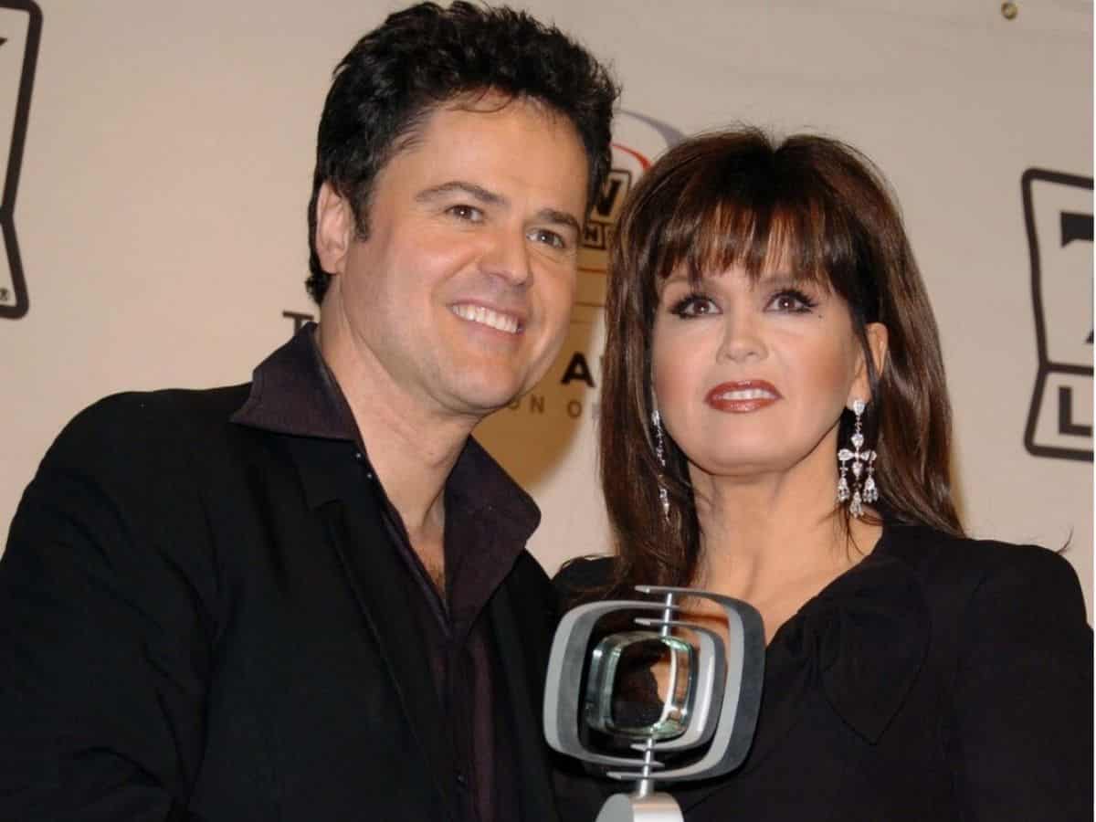 Donny and Marie Osmond at an award show.