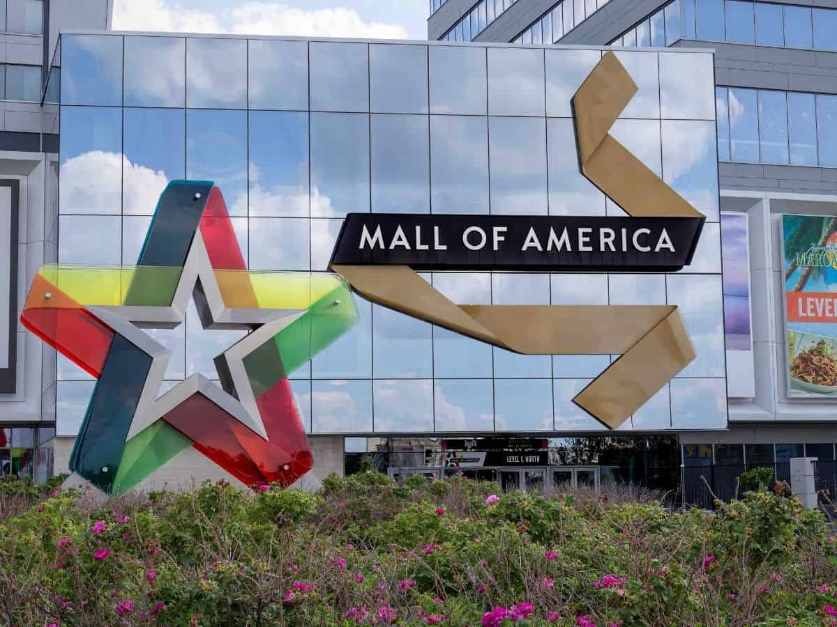 The iconic Mall of America sign proudly stands in front of the massive shopping complex.