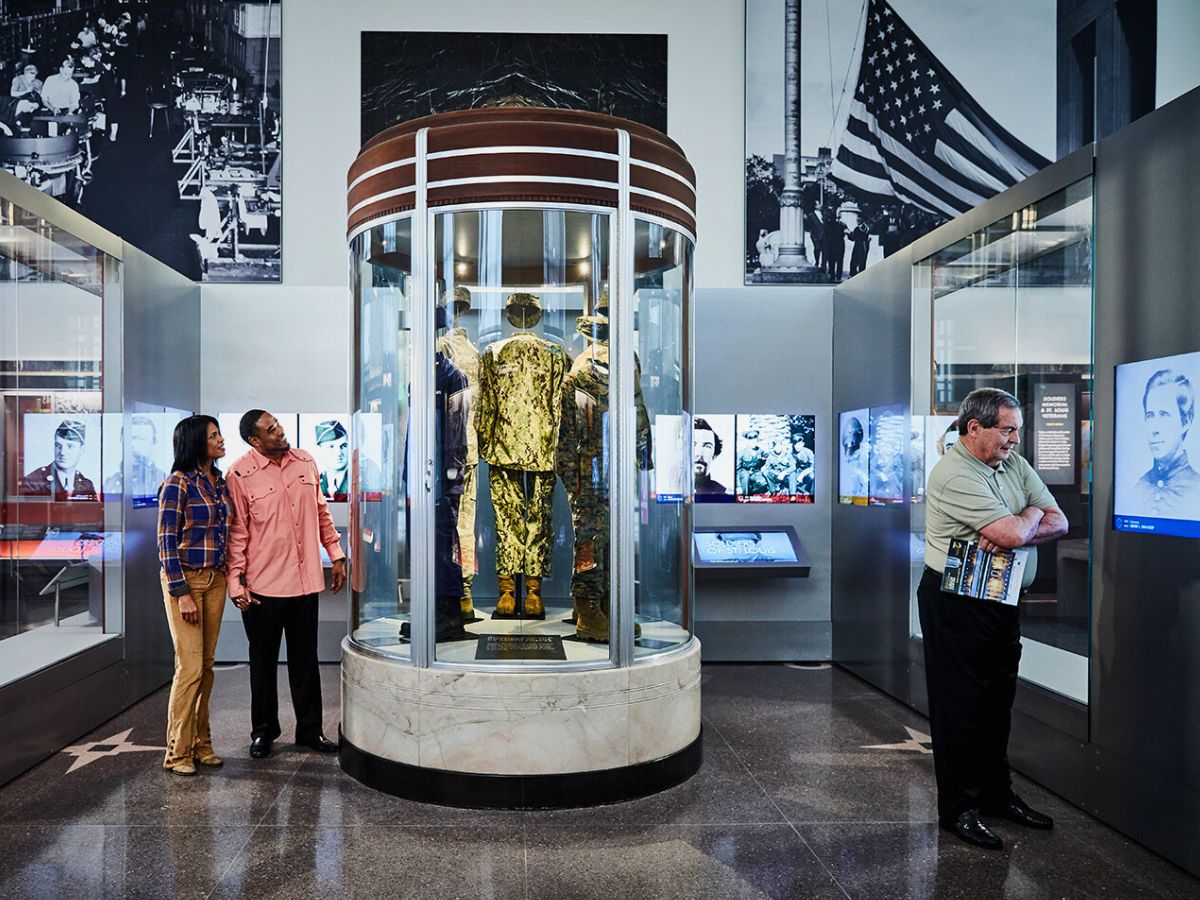 Visitors observing a display at the Soldiers Memorial Military Museum in St. Louis, Missouri.