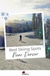 A skier on a snowy mountain slope surrounded by trees with mountains in the background. Text reads, "Best Skiing Spots Near Denver.